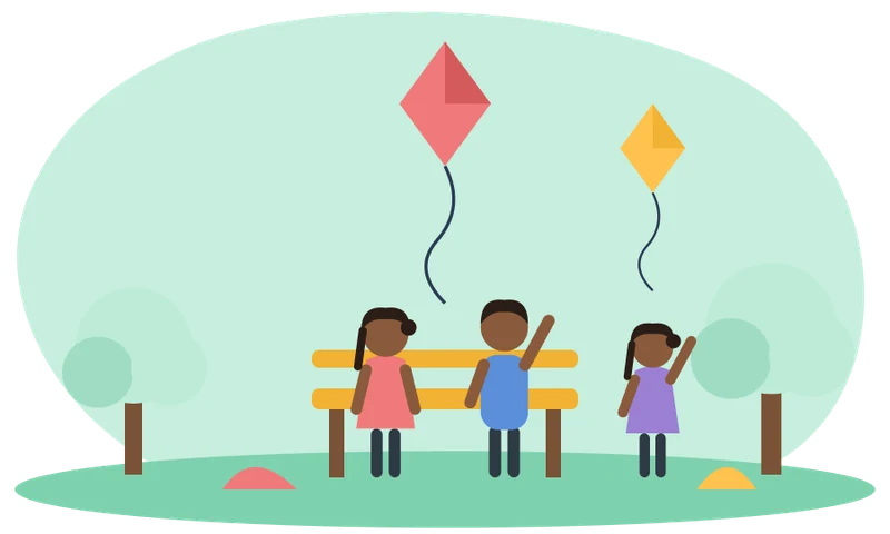 Children on a park bench with kites flying overhead