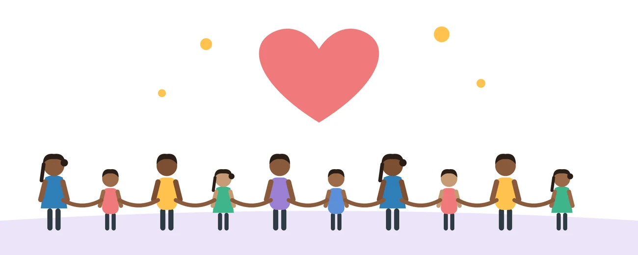 Children holding hands beneath a big heart